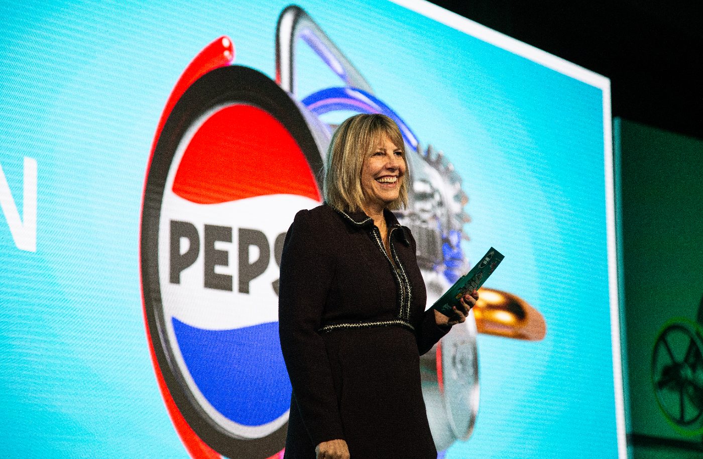 A woman presenting at the carlsberg britvic event
